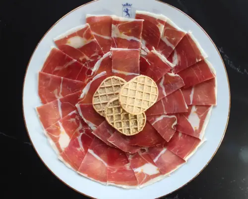 Serrano Ham sliced. The delicious essence of Spanish flavor